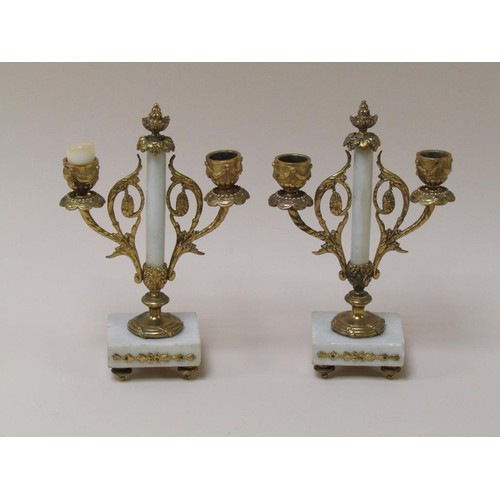 1450 - PAIR OF ALABASTER AND GILT METAL CLOCK GARNITURE CANDLESTANDS, EACH 24cms H