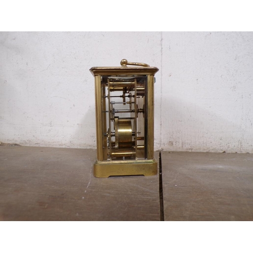 42 - EARLY 20C OAK MANTEL CLOCK; BRASS CASED CARRIAGE CLOCK