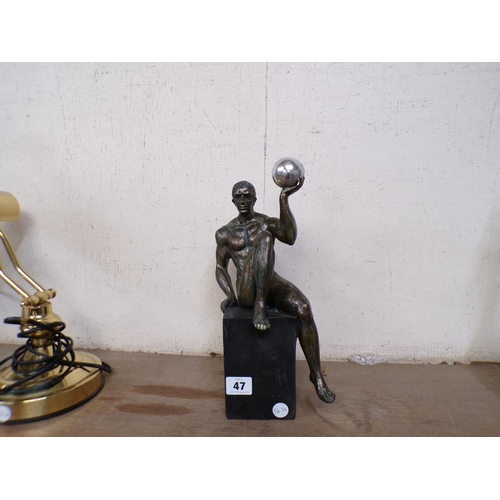 47 - BRONZED FIGURE WITH SPHERE