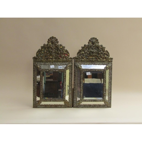 1283 - PAIR OF LATE 19C/EARLY 20C EMBOSSED BRASS PANEL WALL MIRRORS, EACH 60CM X 34CM