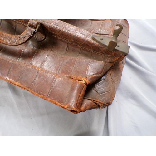 1338 - EARLY 20C CROCODILE SKIN BAG, 65CM W