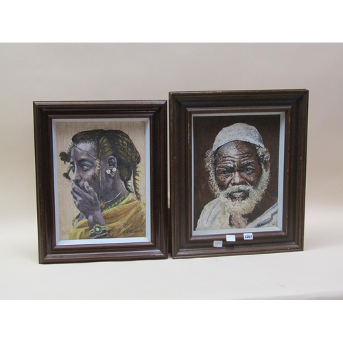 1267 - J.S MUNNOLLI - TWO AFRICAN FACES, SIGNED, EACH FRAMED APPROX 40CM X 30CM