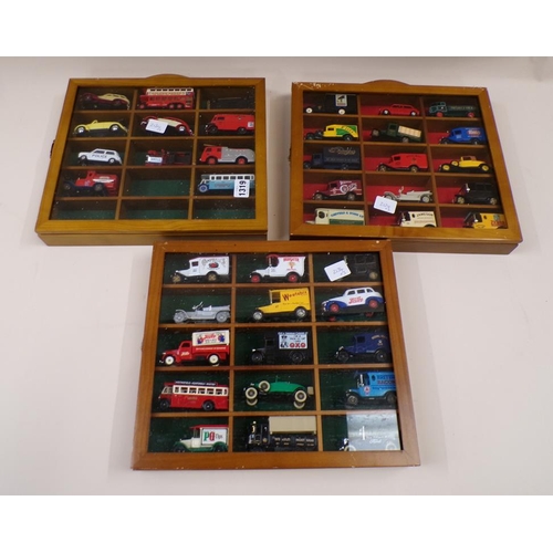 1319 - COLLECTION OF FORTY ONE DAYS GONE BY MODEL VEHICLES IN THREE DISPLAY CABINETS