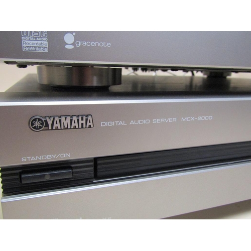 1332B - YAMAHA TWO MCX/2000 MUSIC SERVERS AND YAMAHA SPEAKERS