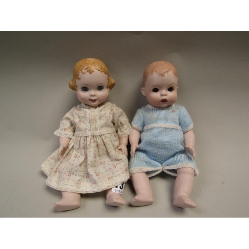 1311 - TWO BISQUE HEADED DOLLS AND CLOTHING