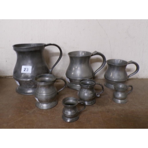 23 - SET OF PEWTER MEASURES