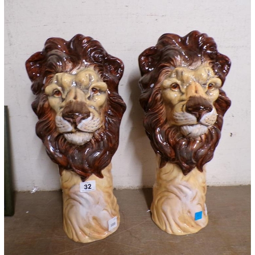 32 - PAIR OF PORCELAIN LION HEAD VASES