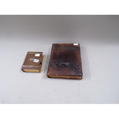 1373 - TWO LEATHER BOUND PHOTO ALBUMS AND CONTENTS