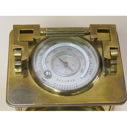 11 - A late 19c French brass desk clock in the form of a large carriage clock with multiple functions.  T... 