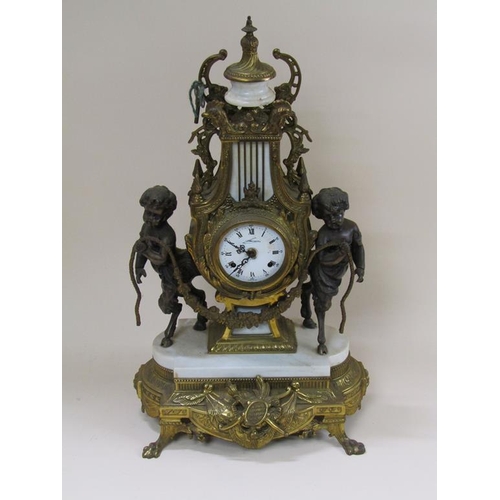 8 - A mid 20c Italian garniture de cheminée consisting of a clock and two six branch candelabra.  The fi... 