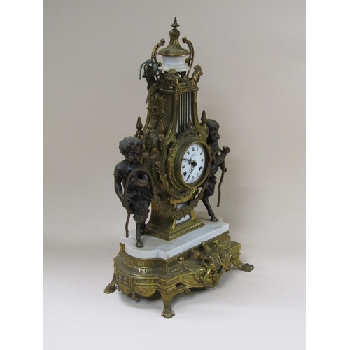 8 - A mid 20c Italian garniture de cheminée consisting of a clock and two six branch candelabra.  The fi... 