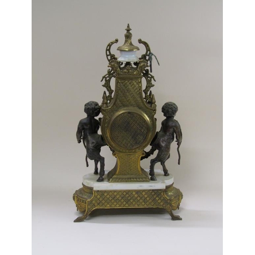 8 - A mid 20c Italian garniture de cheminée consisting of a clock and two six branch candelabra.  The fi... 