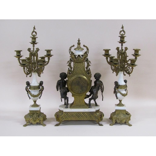 8 - A mid 20c Italian garniture de cheminée consisting of a clock and two six branch candelabra.  The fi... 