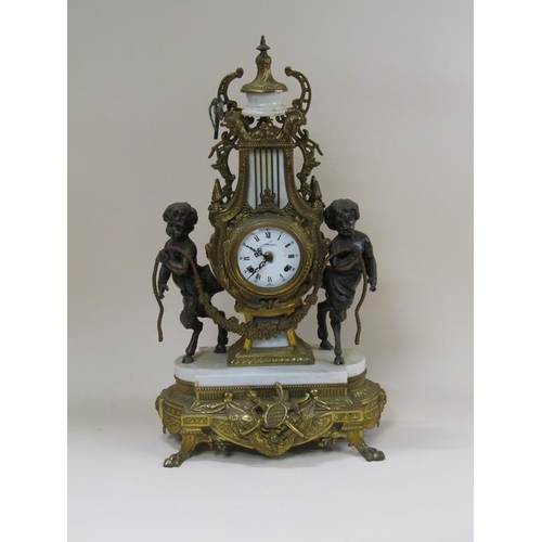 8 - A mid 20c Italian garniture de cheminée consisting of a clock and two six branch candelabra.  The fi... 