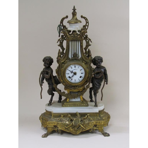 8 - A mid 20c Italian garniture de cheminée consisting of a clock and two six branch candelabra.  The fi... 