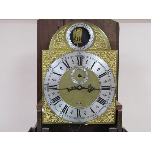 25 - A mid 18c eight day longcase clock by Jonah Walker of London, the 30cm brass arched dial having urn ... 