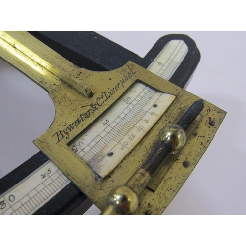 31 - A 19c brass and ebony octant, inscribed and manufactured by Bywater & Co, Liverpool, bearing a plaqu... 