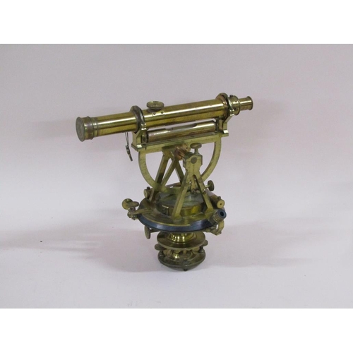 38 - A mid 19c brass level with compass bearing, with a 38cm tube, in fitted box.