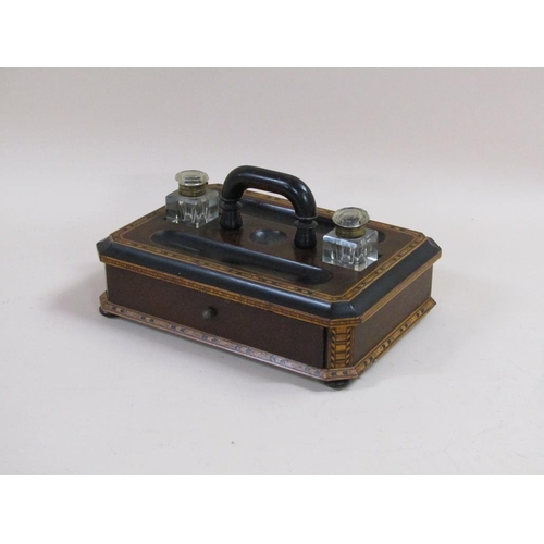 58 - A late Victorian walnut ebonised and Tunbridge banded two bottle inkstand with pull out frieze drawe... 