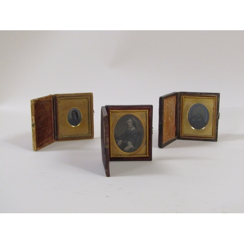 1308 - THREE LEATHER GILT FRAMED DAGUERREOTYPE PORTRAITS