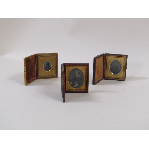 1308 - THREE LEATHER GILT FRAMED DAGUERREOTYPE PORTRAITS