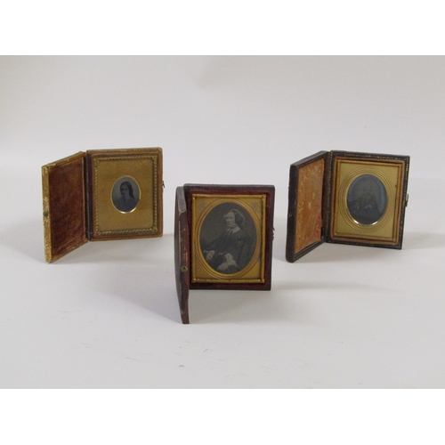 1308 - THREE LEATHER GILT FRAMED DAGUERREOTYPE PORTRAITS