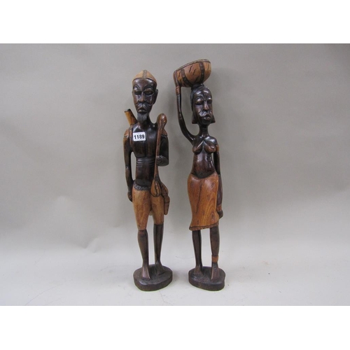 1189 - PAIR OF TALL CARVED AFRICAN FIGURES, LARGEST 65cms