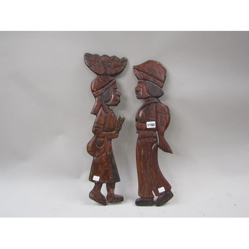 1192 - PAIR OF AFRICAN CARVED WOODEN PANELS,  54cms H