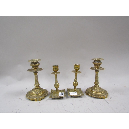 1246 - TWO PAIRS OF CAST BRASS VICTORIAN CANDLESTICKS - LARGEST PAIR 17.5cms H