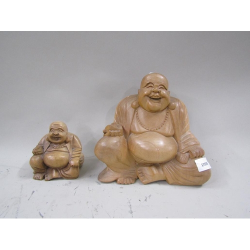 1260 - LARGE CARVED WOODEN BUDDHA AND A SMALLER ONE, LARGEST 23cms H