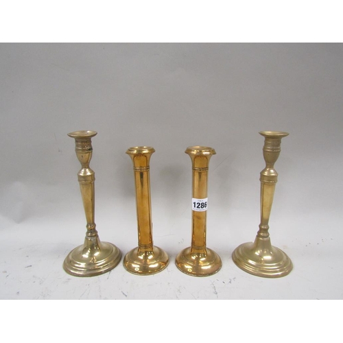 1286 - TWO PAIRS OF ANTIQUE BRASS CANDLESTICKS, LARGEST 25cms H