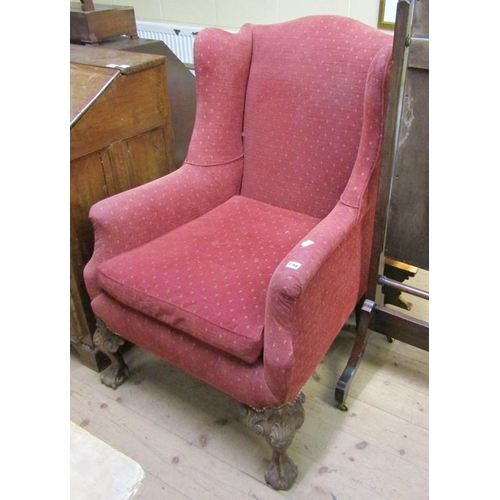 1766 - RED UPHOLSTERED WING BACK ARMCHAIR