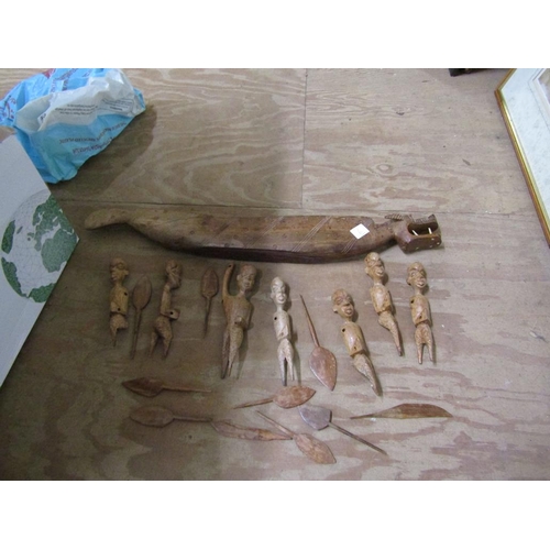 194 - CARVED AFRICAN CANOE AND FIGURES