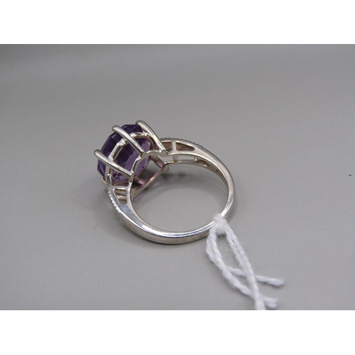 1525 - SILVER AND AMETHYST RING SIZE O