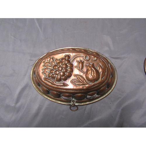 60 - PAIR OF COPPER JELLY MOULDS