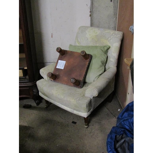 682 - UPHOLSTERED ARMCHAIR AND A STOOL