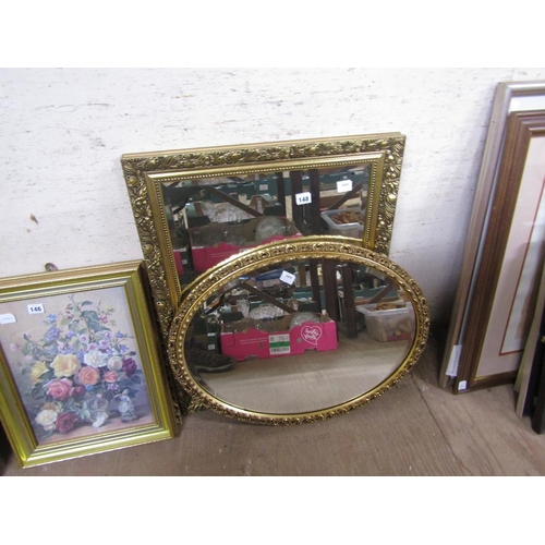 148 - TWO GILT FRAMED WALL MIRRORS