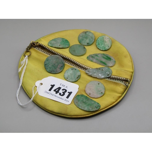 1431 - ELEVEN CARVED JADE PENDANTS