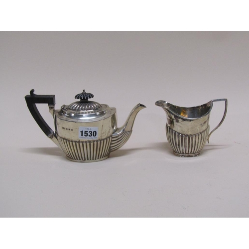 1530 - SMALL SILVER TEAPOT AND A SILVER CREAM JUG - CREAM JUG MARKS FOR MAPPIN BROS. COMBINED WEIGHT OF 12o... 