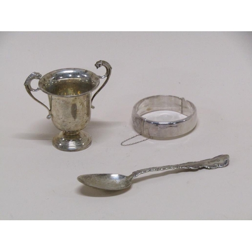 1544 - SILVER BANGLE, SILVER SPOON, SILVER MINIATURE TROPHY CUP - 3.2ozt