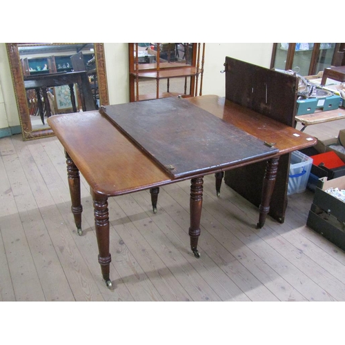 1718 - MID VICTORIAN EXTENDING DINING TABLE HAVING TWO LEAVES 245cms W EXTENDED