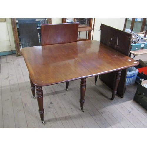 1718 - MID VICTORIAN EXTENDING DINING TABLE HAVING TWO LEAVES 245cms W EXTENDED