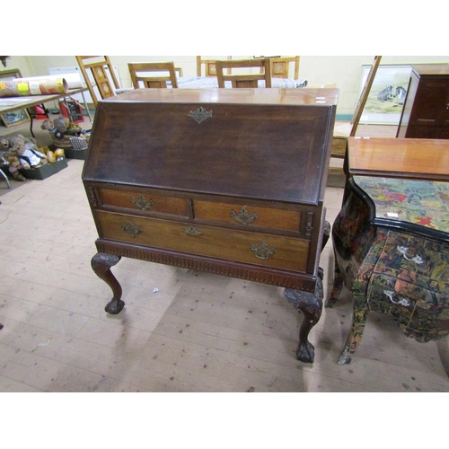 1723 - MAHOGANY BUREAU WITH FALL FRONT AND FITTED INTERIOR SUPPORTED ON CARVED CABRIOLE LEGS WITH BALL AND ... 