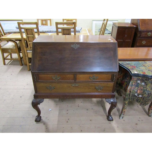 1723 - MAHOGANY BUREAU WITH FALL FRONT AND FITTED INTERIOR SUPPORTED ON CARVED CABRIOLE LEGS WITH BALL AND ... 