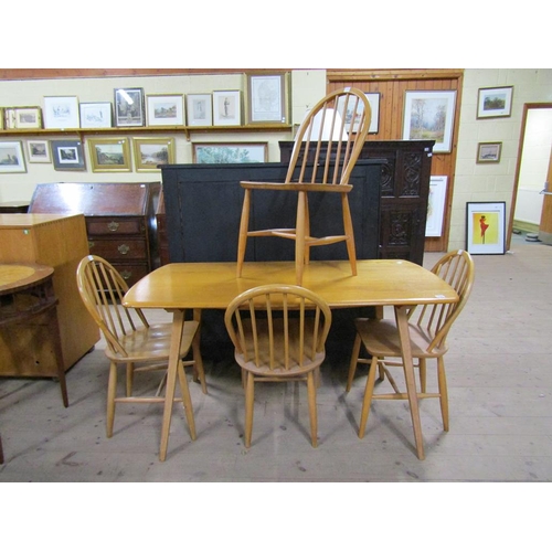 1727 - ERCOL TEAK DINING TABLE 136cms L, TOGETHER WITH FOUR HOOPED SPINDLEBACK SINGLE CHAIRS