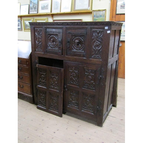 1736 - PERIOD OAK CUPBOARD WITH CARVED PANELS TO THE UPPER AND LOWER CUPBOARD - 110cms W x 140cms H