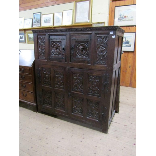 1736 - PERIOD OAK CUPBOARD WITH CARVED PANELS TO THE UPPER AND LOWER CUPBOARD - 110cms W x 140cms H