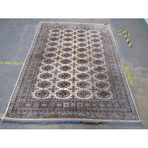 1740 - ORIENTAL FAWN GROUND PATTERNED RUG 235 x 172 cms