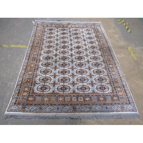 1741 - ORIENTAL WOOLLEN BLUE AND FAWN GROUND RUG 232 cms x 170 cms