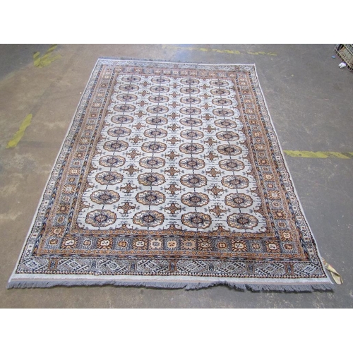 1741 - ORIENTAL WOOLLEN BLUE AND FAWN GROUND RUG 232 cms x 170 cms